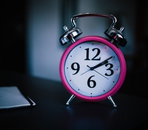 Alarm clock on bedside table